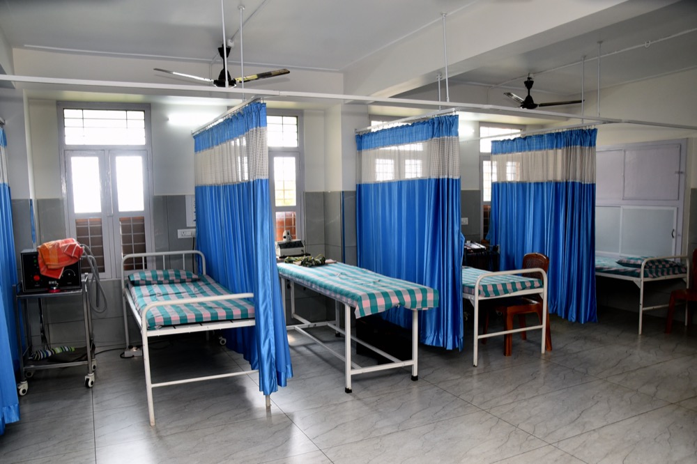 Patient care ward with privacy curtains